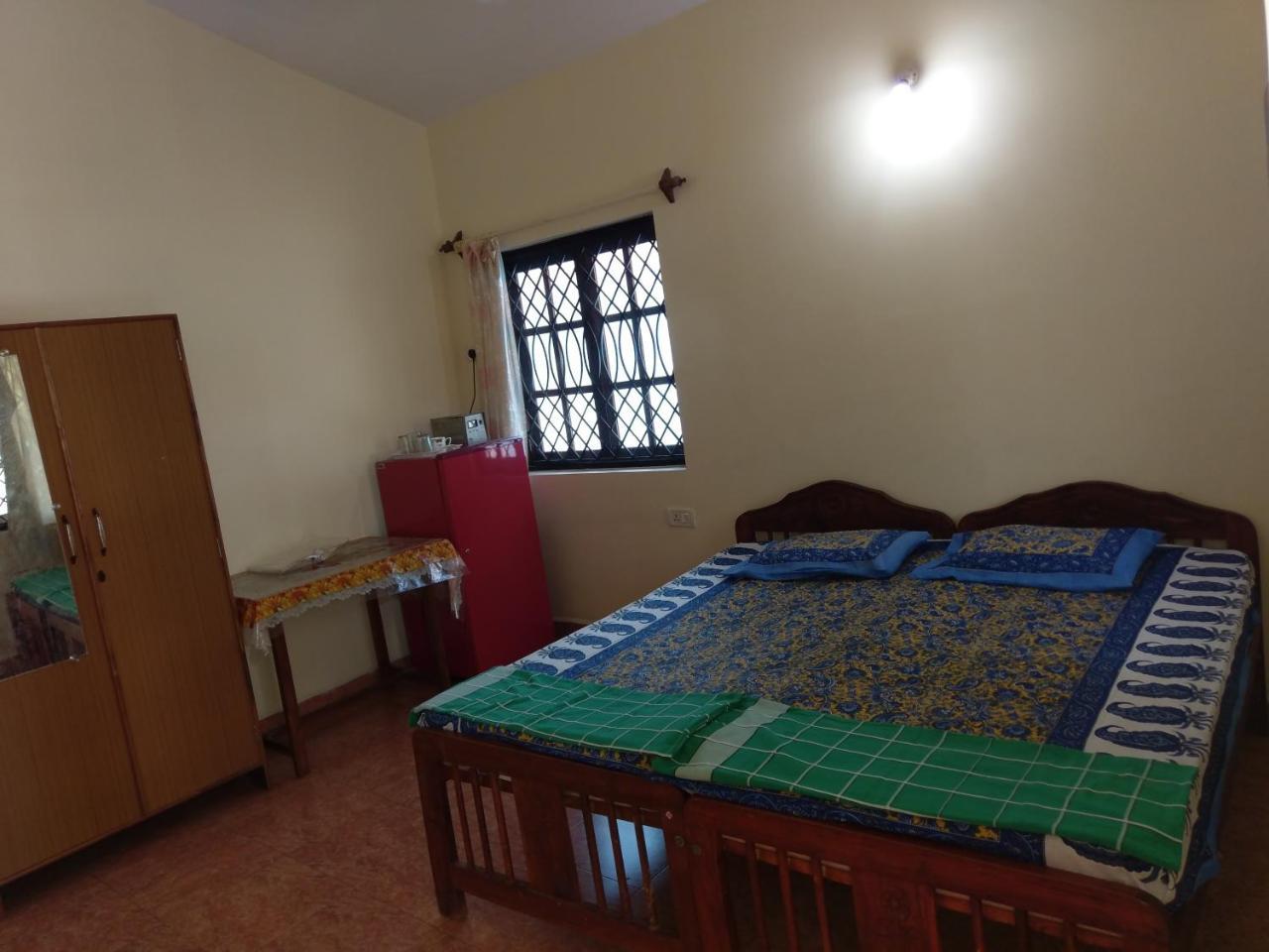 21In Guest House Calangute Værelse billede